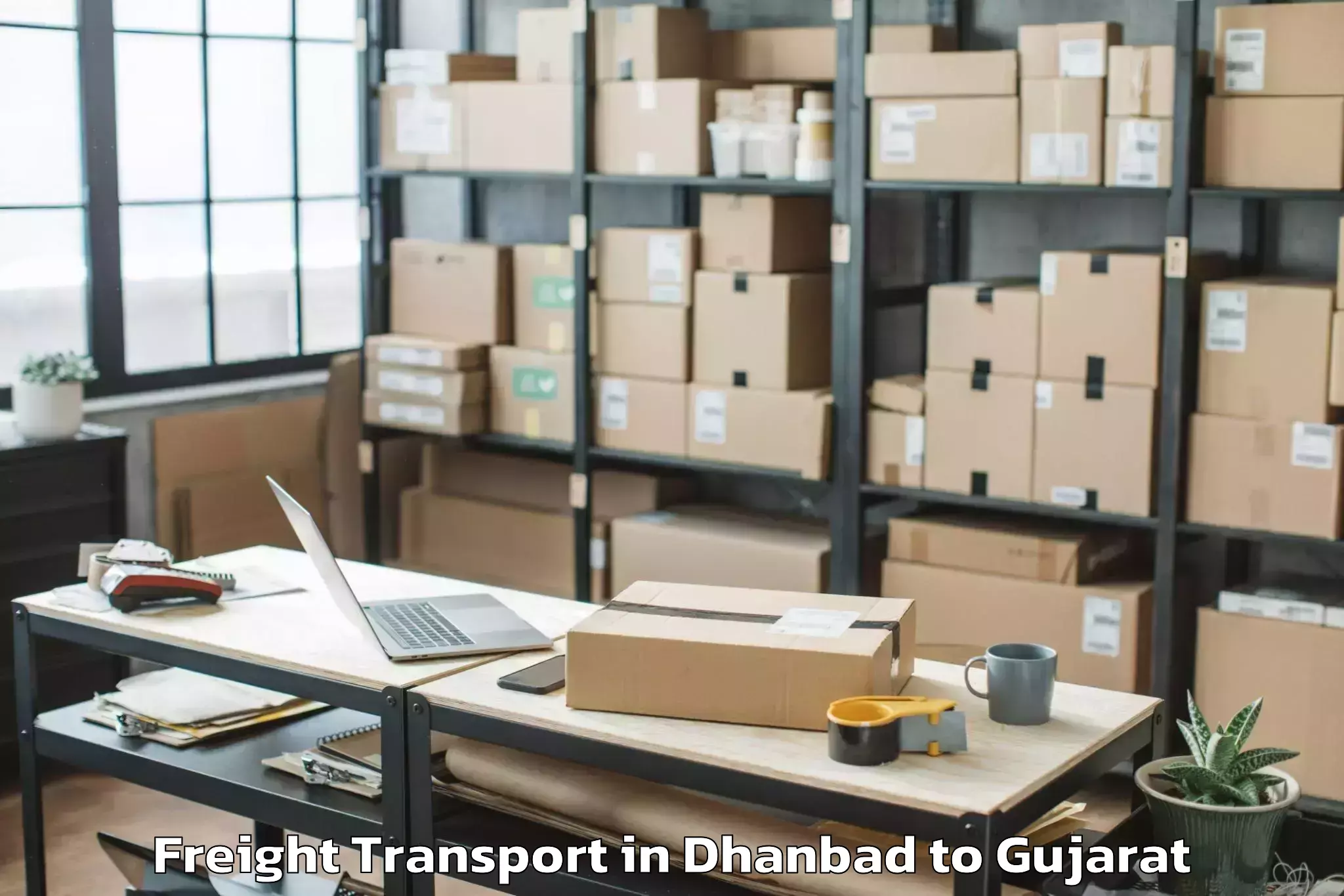 Reliable Dhanbad to Shree Somnath Sanskrit Univers Freight Transport